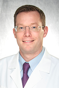 Photo of E. Michael Powers, MD, MBA